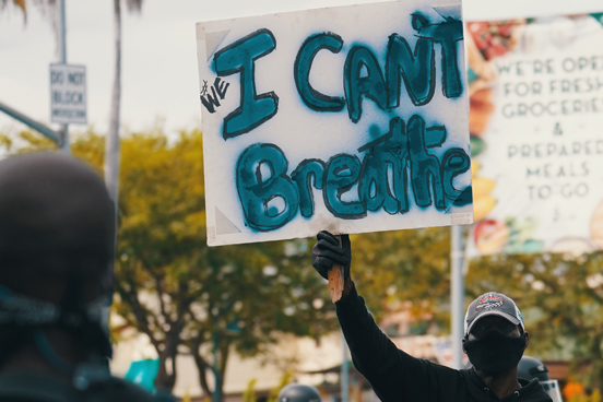 Protestor holding up sign that reads 'I can't breathe'