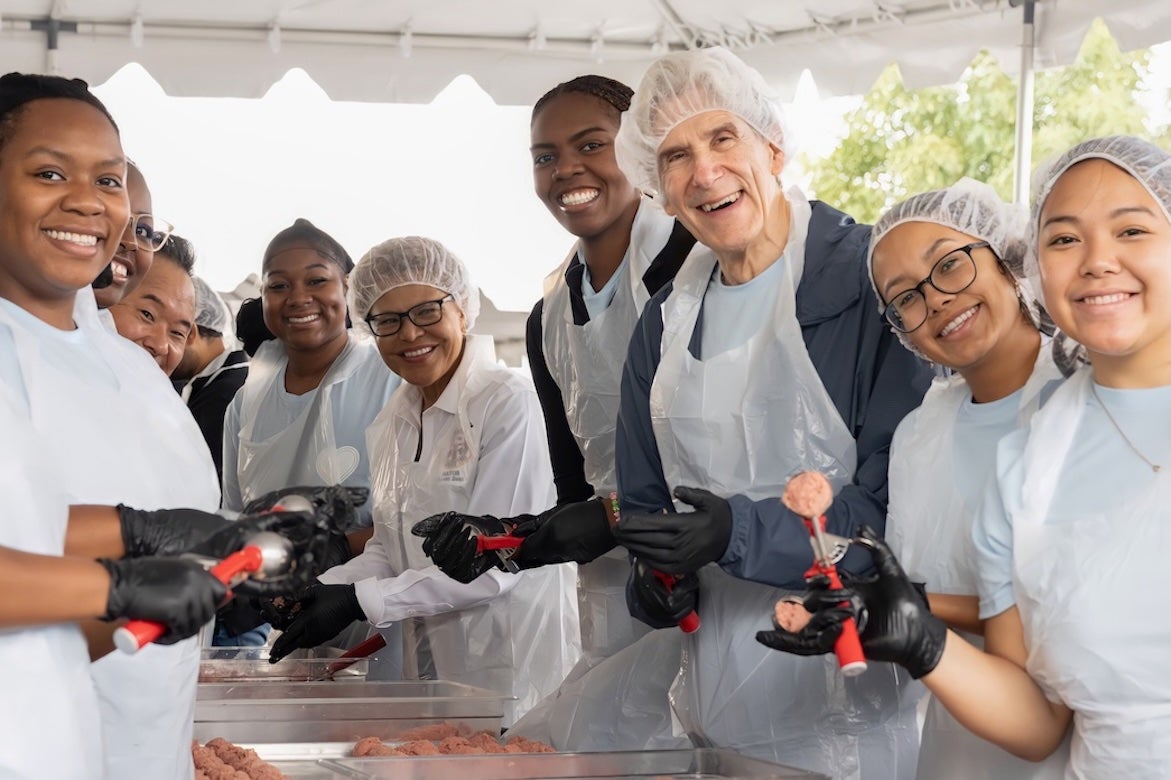 Chancellor Julio Frank Mayor Karen Bass and students making meatballs