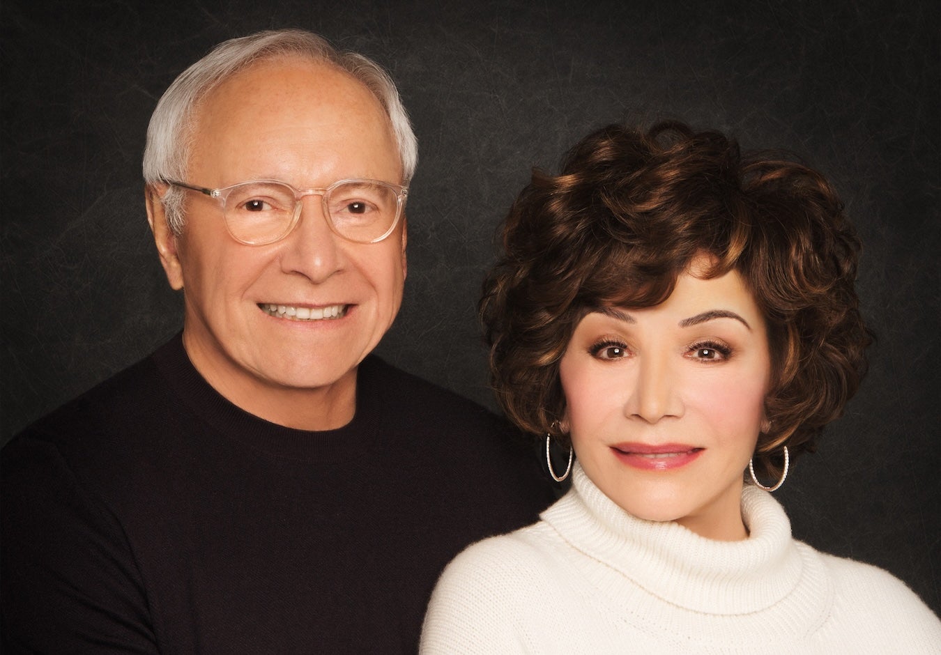 A couple, Stewart and Lynda Resnick, sitting side by side