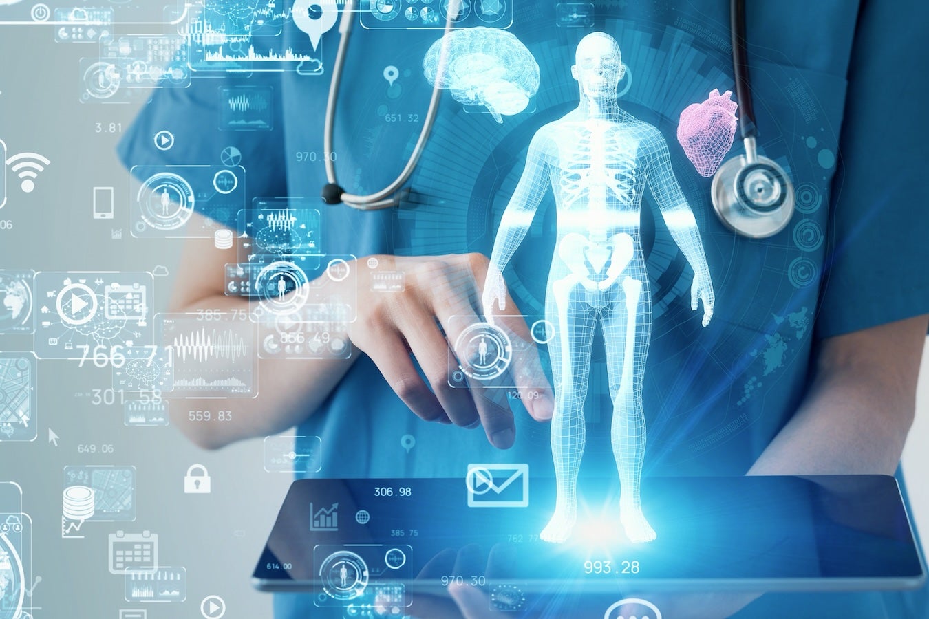 Image showing nurse (torso only) typing onto a pad with physiological graphics overlaid