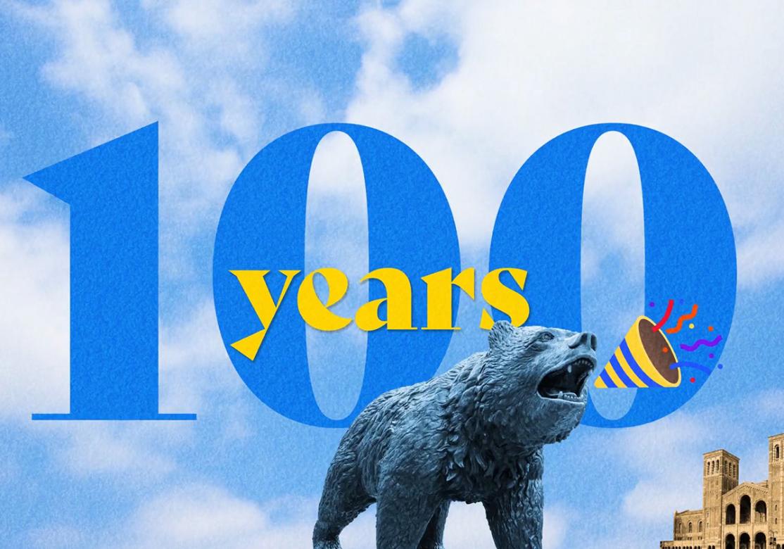 Bruin bear statue in front of "100 years" graphic on UCLA's campus.
