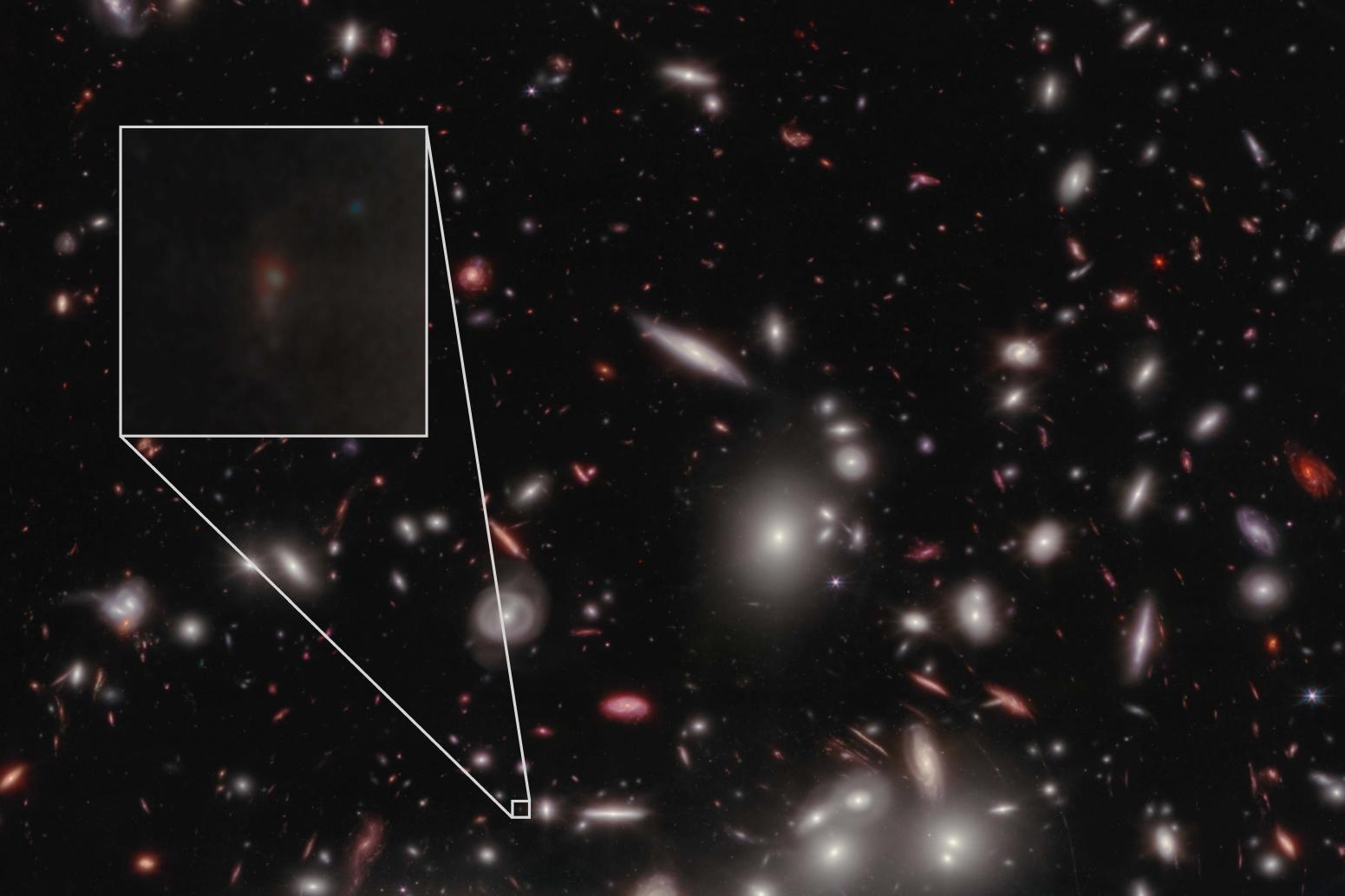 A projected image of the galaxy JD1 (inset), which is located behind a bright cluster galaxy called Abell2744.