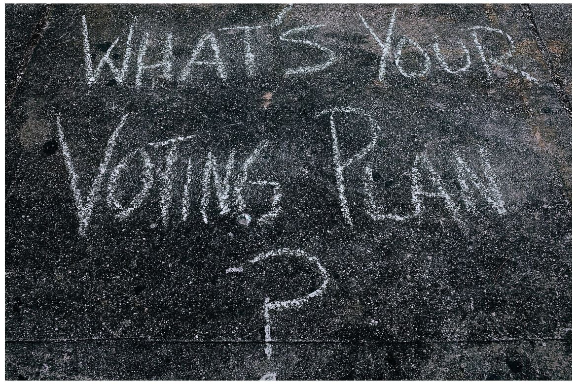 "What's your voting plan?" written on a chalkboard