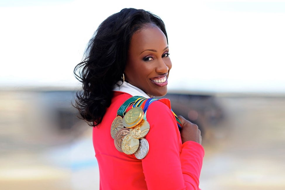 Jackie Joyner-Kersee with her Olympic medals — three gold, one silver and two bronze