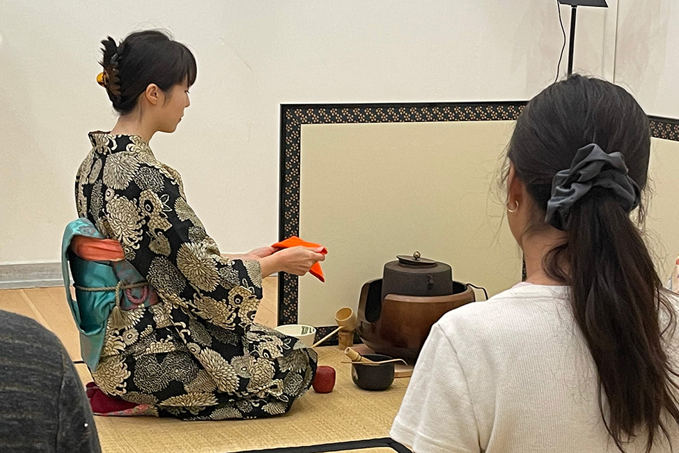 Assistant instructor Kaoru Kuribayashi prepares for a tea ceremony during one of UTeaLA’s weekly practice sessions.