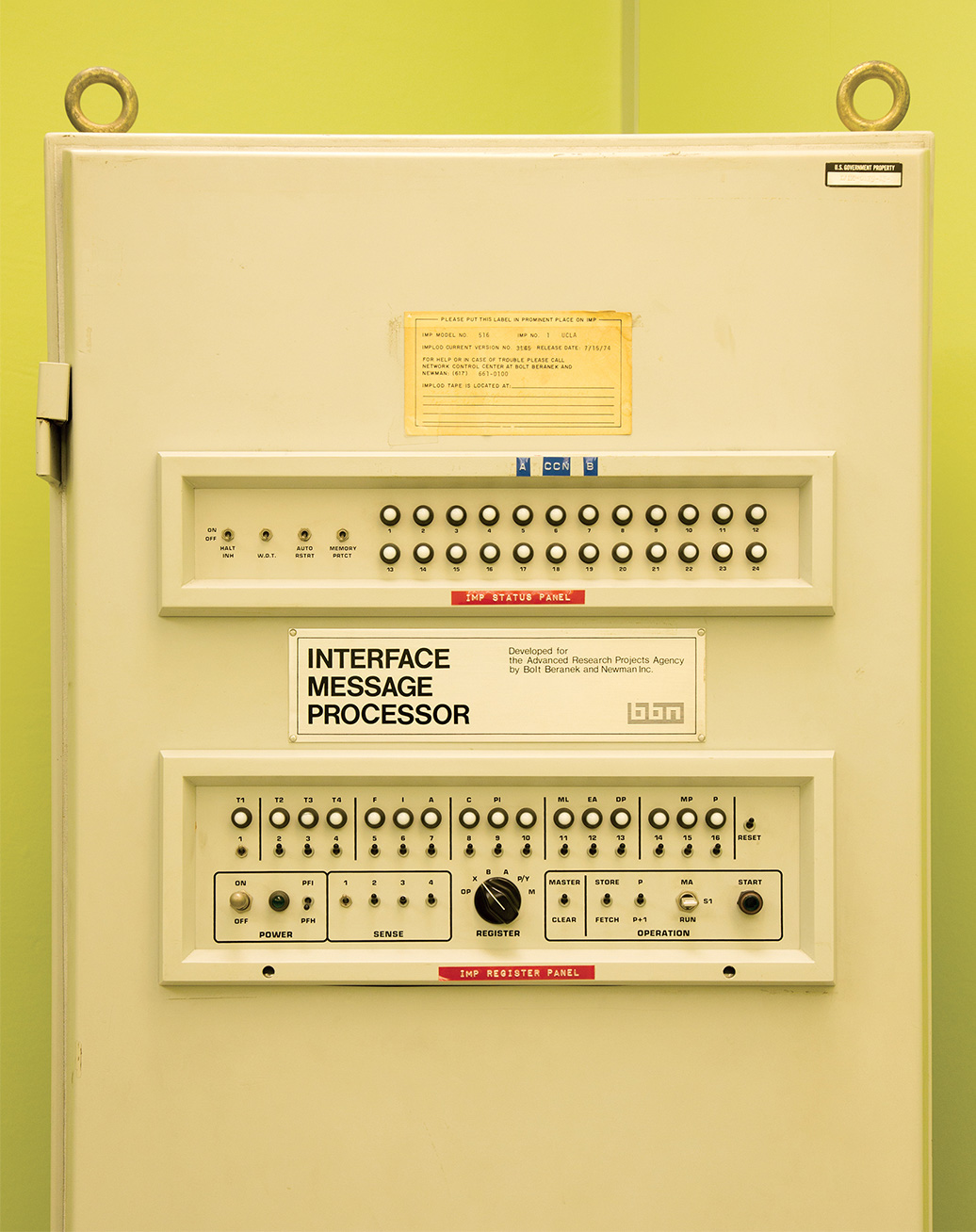 An image of the ARPANET computer network showing its many lights and switches.