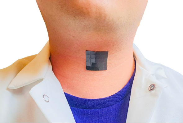 A medical patch on the neck