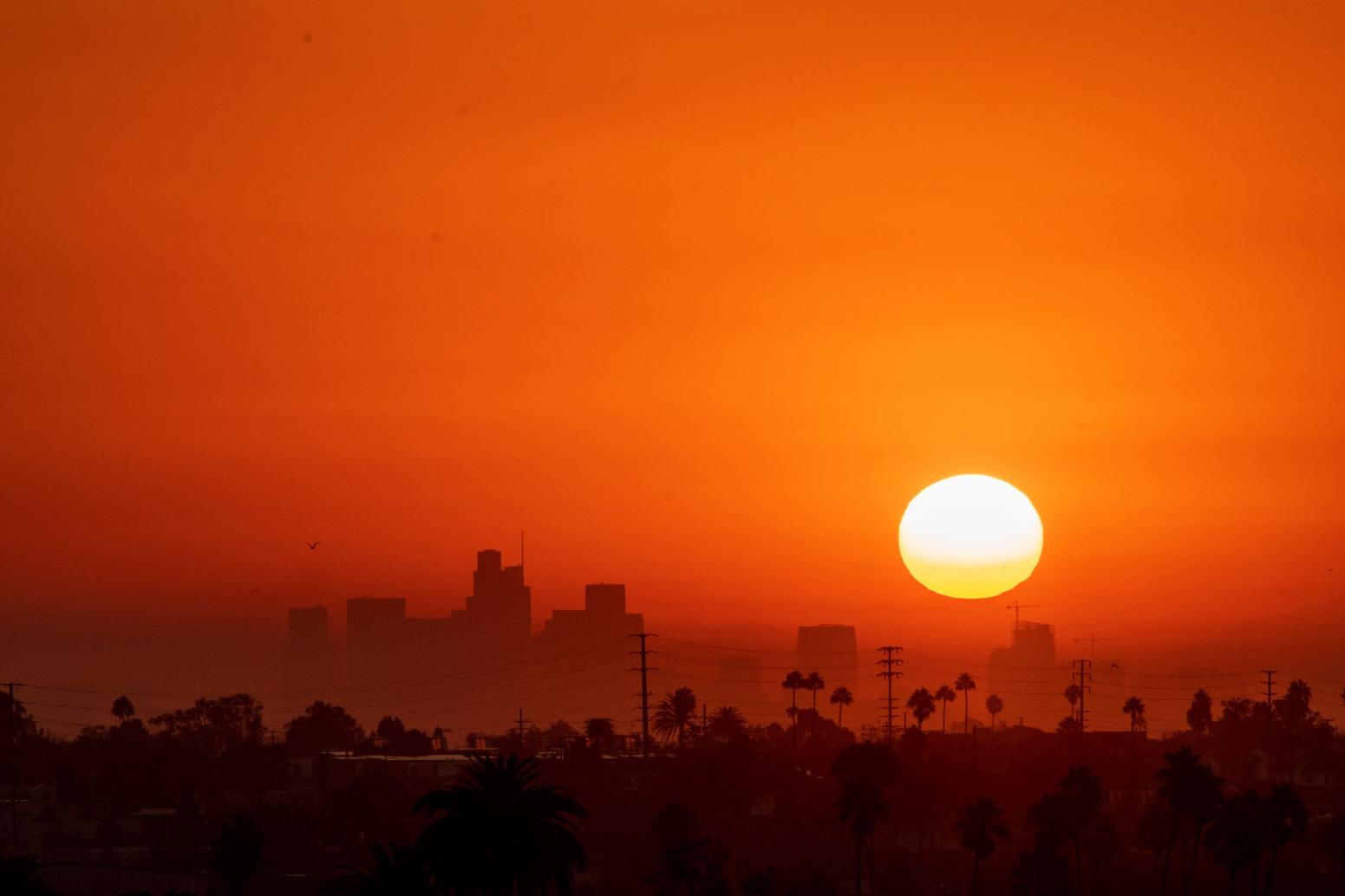 Sun rises over Los Angeles during 2022 heat wave