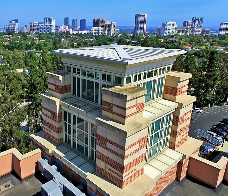 Aerial view of the Hugh and Hazel Darling Law Library and the city.